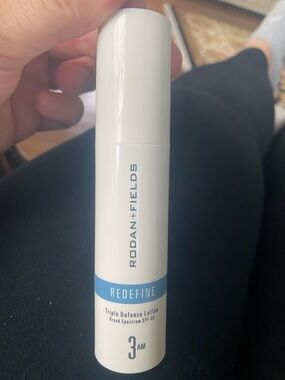 Rodan + Fields White and Blue Skincare Pump Bottle